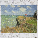 Cliff Walk vid Pourville av Claude Monet Pussel<br><div class="desc">Cliff Walk vid Pourville (1882) av Claude Monet är en vintage bra- konsthantverk nautisk målning. Ett sjölandskap med två kvinnor som står på en klippande havsklipp. Dam bär parasoler och förbiser vågar på havet en solig sommardag. Om konstnären: Claude Monet (1840-1926) var en av grundarna av den Fransk målningsrörelsen och...</div>