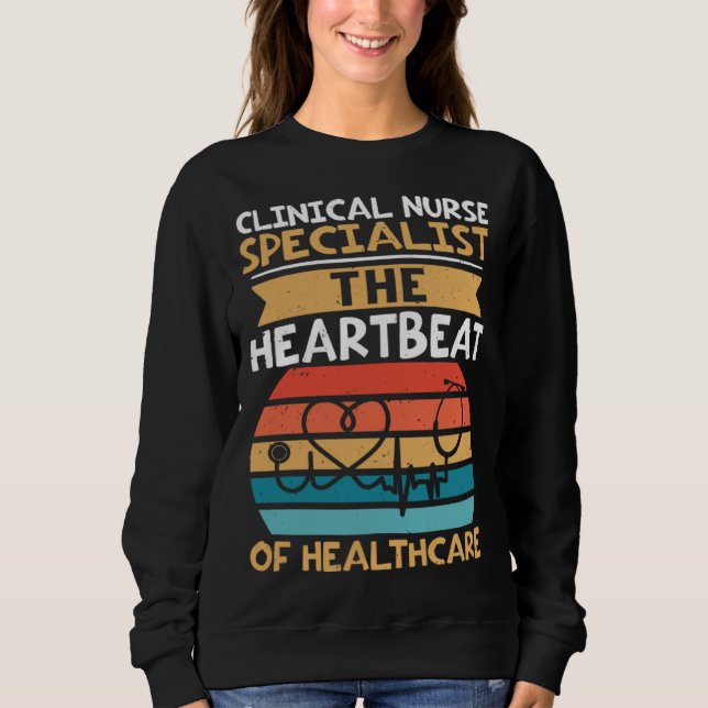 Clinical Nurse Specialist The Heartbeat of Healthc T Shirt (Framsida)