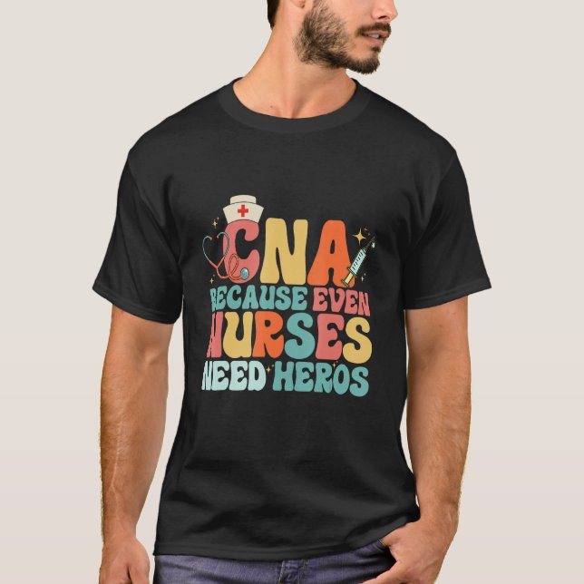 CNA Humor Because Even Nurses Need Heroes  Nurse T Shirt (Framsida)