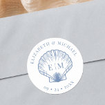 Coastal Blue Beach Shell Monogram Wedding Runt Klistermärke<br><div class="desc">These coastal blue beach scallop shell monogram wedding stickers will add the perfect finishing touch to your coastal chic wedding invitations,  favors,  and more. Please see the collection for the matching wedding invitation suite and more matching products.</div>