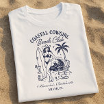 Coastal Cowgirl Beach Klubb Bachelorette T Shirt<br><div class="desc">Saddla upp för solljus och fira din blivande brud med den här Klubben av Kusttufon Beach-bakteriotten. Med en vintage cowgirl på stranden med handflatan träd, surfboard och cocktails, är denna lekfulla ändå chic perfekt för alla tropiska, westernt inspirerade flickors flyktväg. Anpassa den med din händelseinformation och få redot att skryta...</div>