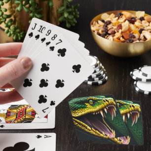 Cobra-orm med pulserande grönt och gult casinokort