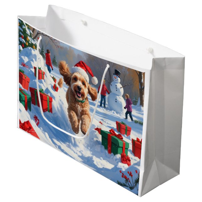 Cockapoo springer i snö med julhatt (Framsidan Vinklad)
