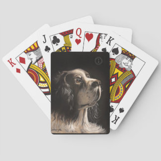 cocker spaniel som spelar pokerkort casinokort