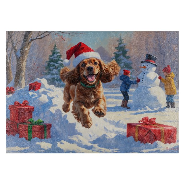 Cocker Spaniel springer i snö med julhatt (Framsidan)