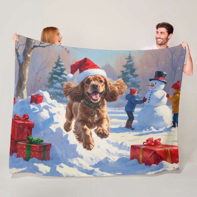 Cocker Spaniel springer i snö med julhatt Fleecefilt (På plats)