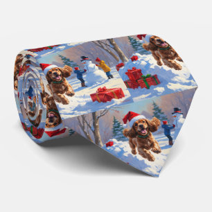 Cocker Spaniel springer i snö med julhatt Slips