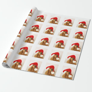 CockerspanielSpanieljul som slår in papper Presentpapper