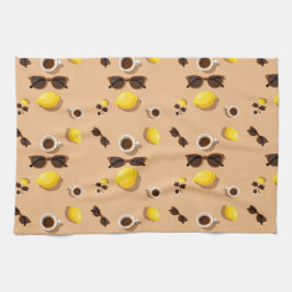 Coffee lemons and sunglasses on a warm sand kökshandduk