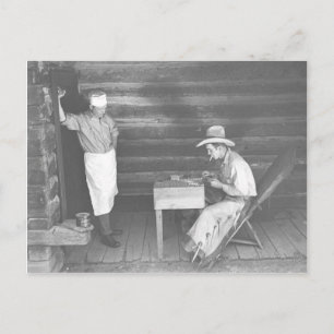 Cook tittar på cowboykort 2 vykort