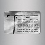 Coola Construction Crane Photo 2025 Calendar Magnet<br><div class="desc">Behållan i hela data med en svart kalender för 2025 över ett grumligt himmel i ett svart och vitt foto på en byggkran. Gör en coola till lagerhållare! Kranen ser ut som ett latat T, dess smala svarta arm som sträcker ut till högerna. Turbulenta visuella moln fyller bakgrunden. Kalendern är...</div>