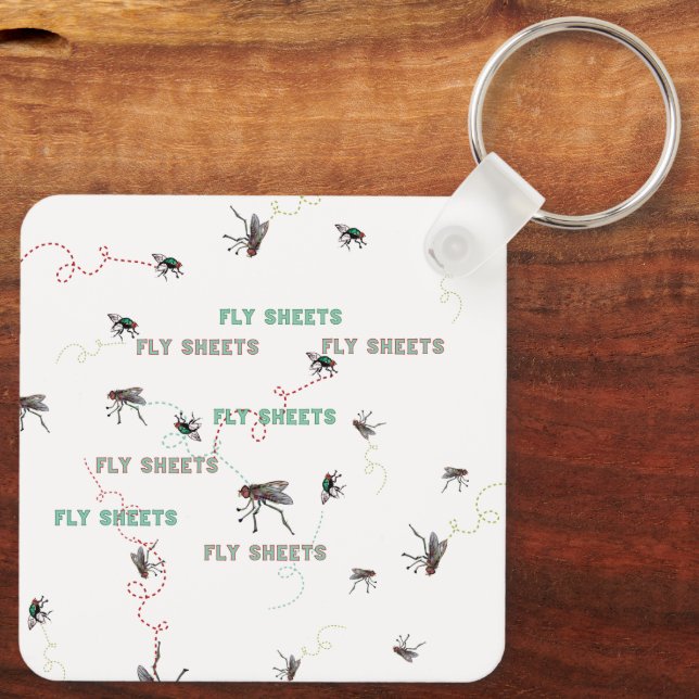 COOLA FLY LAKAN STORY NYCKELRING (Baksida)