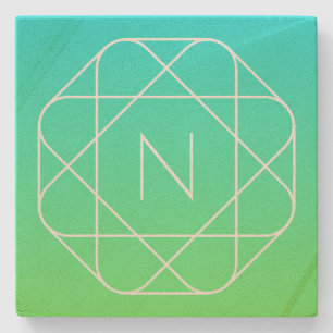 Coolans geometriska monogram Grön gemene och blå Stenunderlägg