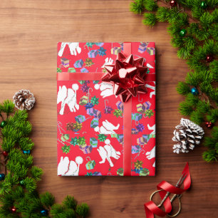 Coolans vita julklapp av elefant som omsluter papp presentpapper