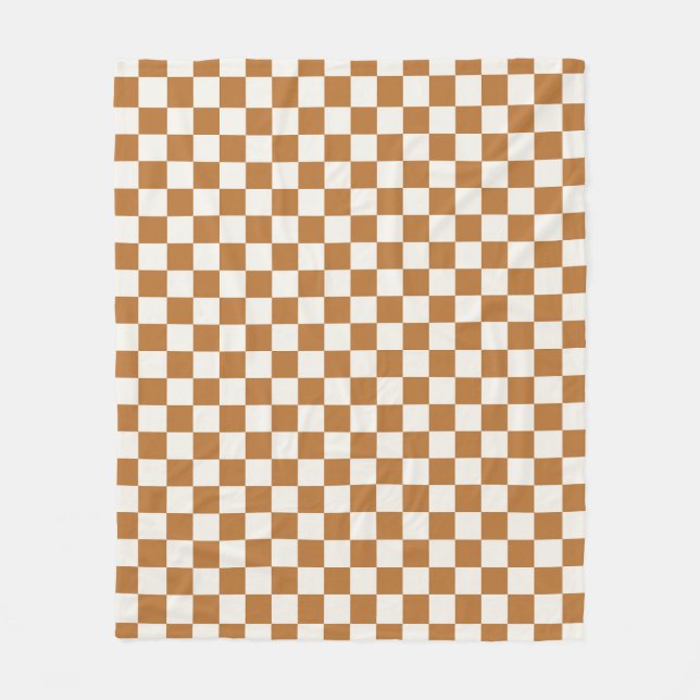 Copper and eggshell checkerboard pattern fleecefilt (Framsidan)