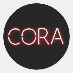 Cora namn i ljusnande neon ljus runt klistermärke