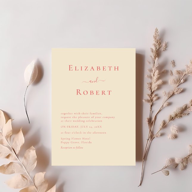 Coral Modern Minimalist Script-bröllopsinbjudan Inbjudningar (Coral Modern Minimalist Script Wedding Invitation on a table with soft pink dry flowers)