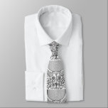 Corbata con diseño artístico en blanco y negro slips<br><div class="desc">Elegante corbata decorada con un patrón lineal y motivos abstractos inspirados en arte ornamental. El diseño combina líneas onduladas y detalles simétricos,  creando un efecto visual llamativo y sofisticado. Ideal para ocasiones formales o para quienes buscan un accesorio único que aporte personalidad a un atuendo clásico.</div>
