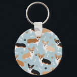 Corgi Hund Tass och Bones Nyckelring<br><div class="desc">Cute Corgi hundar med rött,  rött och tri jackar färg med tass avtryck och hund ben mönster.</div>