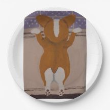 Corgi looking out window