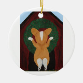 Corgi sätter julkrans på hundhus julgransprydnad keramik