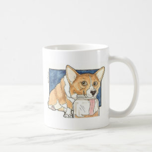 Corgi som slickar jordnötsmörburken kaffemugg