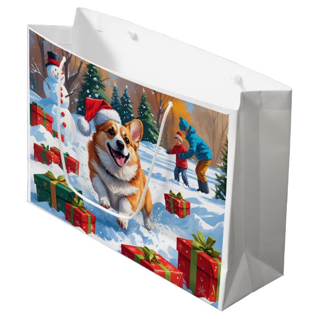 Corgi springer i snö med julhatt (Framsidan Vinklad)