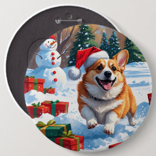 Corgi springer i snö med julhatt knapp