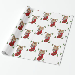 Corgijulstrumpa som slår in papper presentpapper