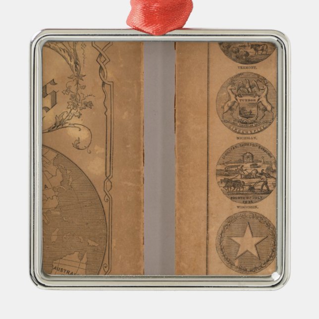 Cornells följekartbok julgransprydnad metall (Framsidan)