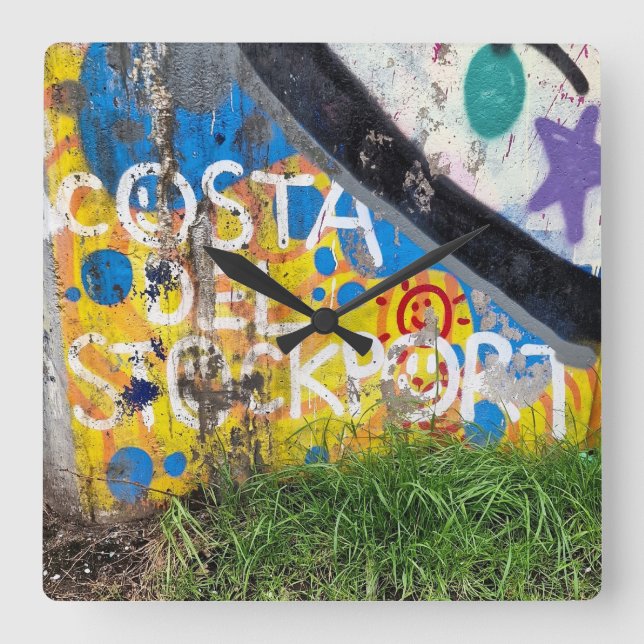 Costa Del Stockport Fyrkantig Klocka (Framsida)