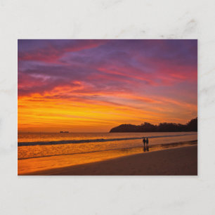 Costa Rican-par vid solnedgången Vykort