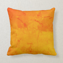 coussin aux couleurs chaudes rouge et jaune kudde