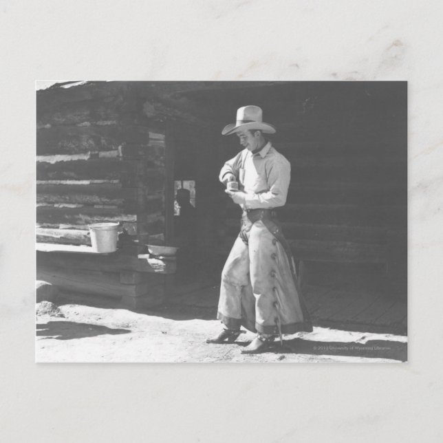 Cowboy äter från en Peter Pan-peanutbutter. Vykort (Framsida)