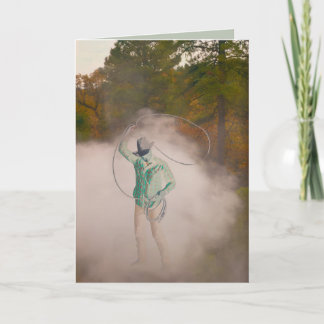 Cowboy man roping stirring up dust out west kort