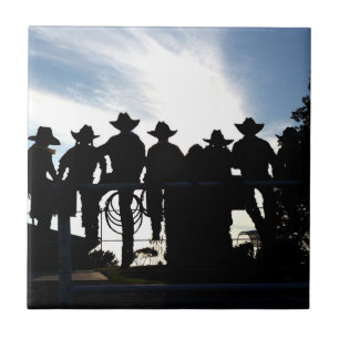 Cowboy- och Cowgirlinställning på staket Kakelplatta
