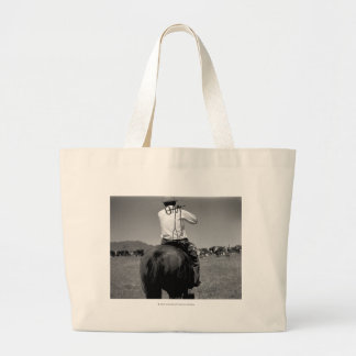 Cowboy på en häst med två märken jumbo tygkasse
