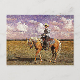 Cowboy på en palominohäst vykort