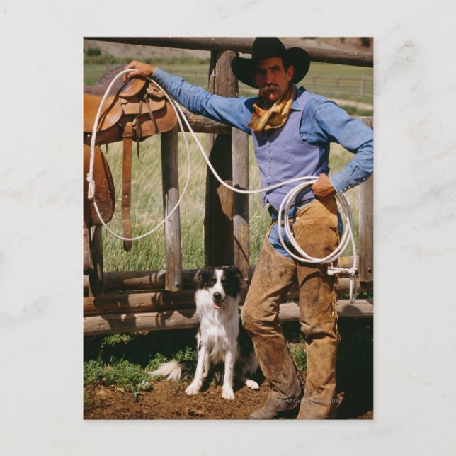 Cowboy poserande med lasso och hund för sällskapsd vykort (Framsida)