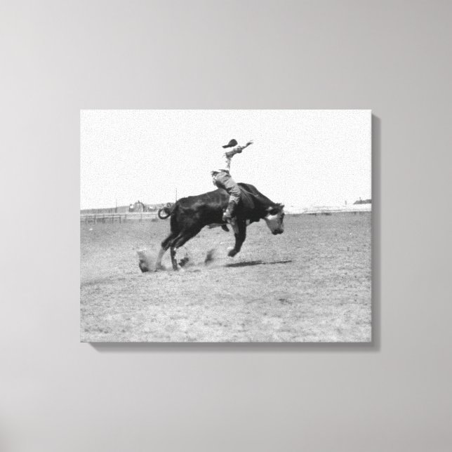 Cowboy Riding a Bucking Bull Canvastryck (Framsida)
