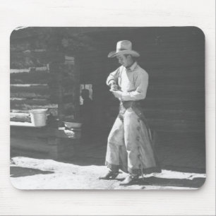 Cowboy som äter från en Peter Pan peanutbutter Musmatta