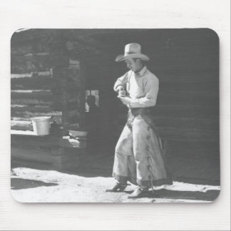 Cowboy som äter från en Peter Pan peanutbutter Musmatta