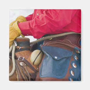 Cowboy till häst iklädd läderchaps magnet
