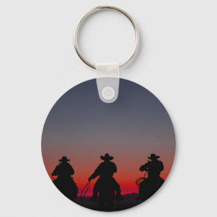 cowboy vid solnedgång nyckelring