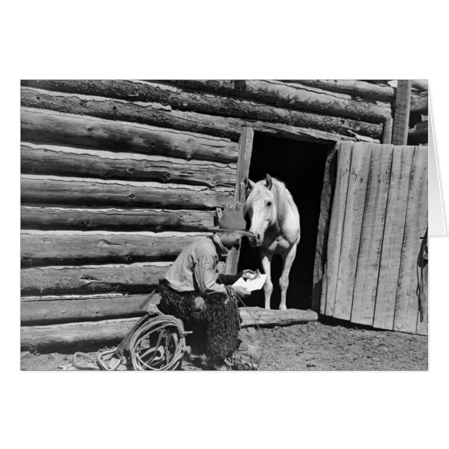 Cowboyen och en häst tittar ett brev hälsningskort (Framsidan Horizontal)