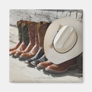 Cowboyhatten ror på av cowboykängayttersida en magnet