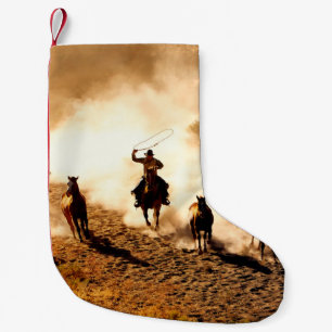 Cowboys jagar vildhästar. Rödning och ridning. Liten Julstrumpa