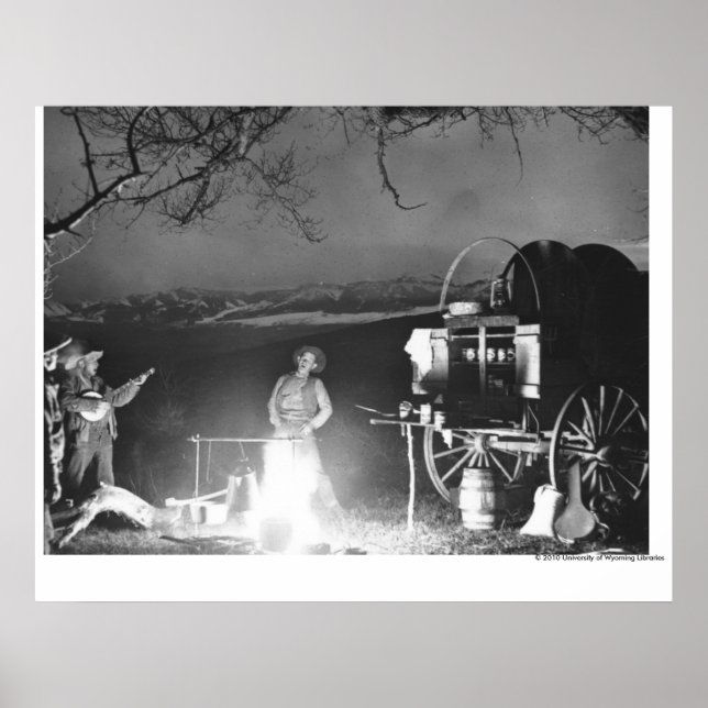 Cowboys leker och sjunger runt en campfire poster (Framsidan)