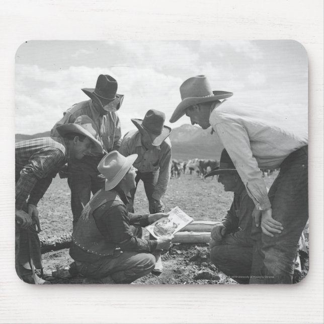 Cowboys tittar en tidskrift musmatta (Framsidan)