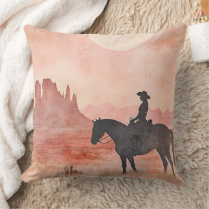 Cowgirl och häst sydvästlig solnedgångssilhuett kudde